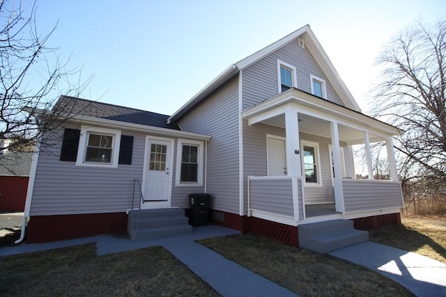 view of front of house with entry steps and covered porch