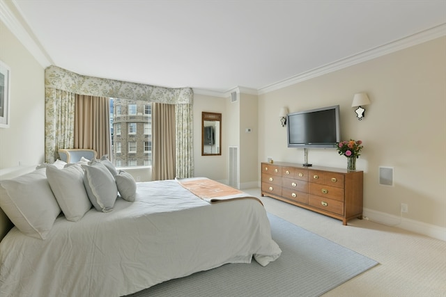 carpeted bedroom featuring crown molding