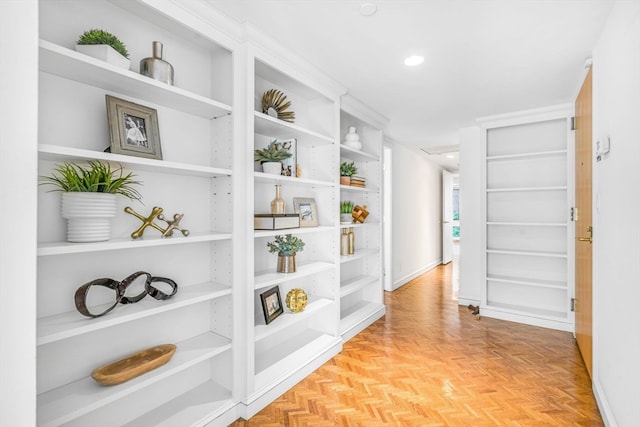 hallway featuring light parquet floors