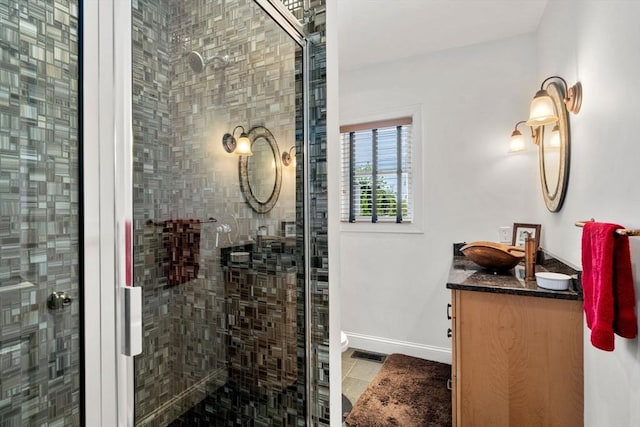 379 Hunnewell St, Needham, MA 02494 - full bathroom with a shower stall, vanity, baseboards, and toilet