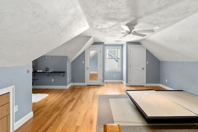 379 Hunnewell St, Needham, MA 02494 - unfurnished bedroom featuring wood finished floors, lofted ceiling, ceiling fan, and baseboards