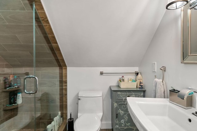 379 Hunnewell St, Needham, MA 02494 - bathroom featuring a sink, toilet, a shower stall, and lofted ceiling