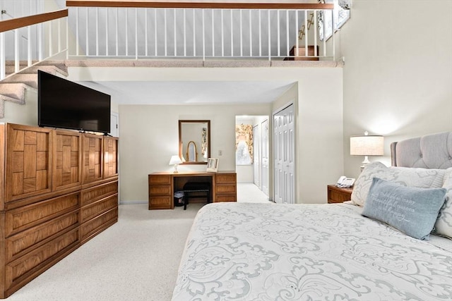46 Michael Rd Unit 46, Bridgewater, MA 02324 - carpeted bedroom featuring a high ceiling, a closet, and ensuite bathroom