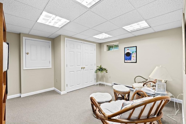 46 Michael Rd Unit 46, Bridgewater, MA 02324 - living area with carpet floors, a paneled ceiling, and a baseboard radiator