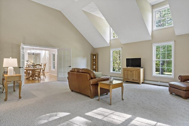 22 Mikayla Ann Dr, Rehoboth, MA 02769 - carpeted living room with high vaulted ceiling, baseboard heating, healthy amount of natural light, and a baseboard radiator