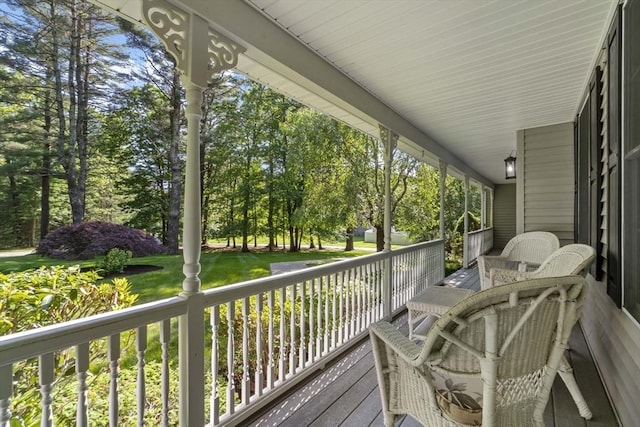22 Mikayla Ann Dr, Rehoboth, MA 02769 - wooden porch featuring view of scattered trees