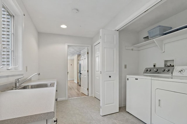 22 Mikayla Ann Dr, Rehoboth, MA 02769 - laundry room featuring separate washer and dryer, baseboards, recessed lighting, and light tile patterned floors