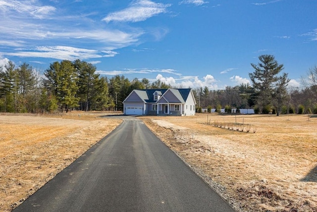 view of front of property with an attached garage and driveway