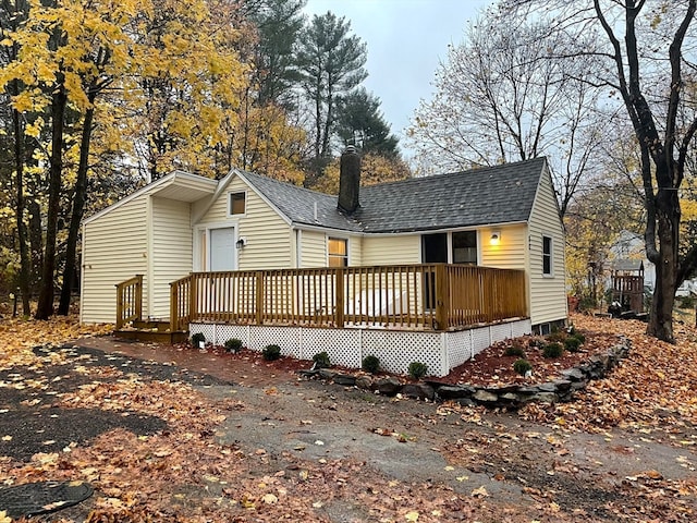 exterior space featuring a wooden deck