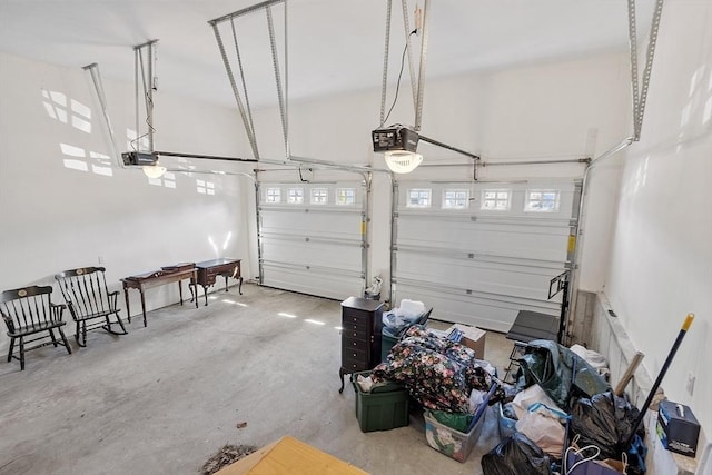 garage featuring a garage door opener