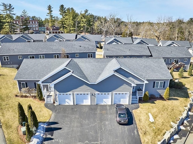 drone / aerial view featuring a residential view