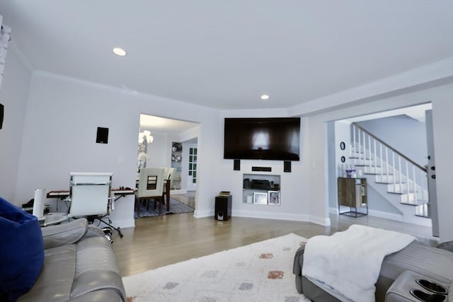 21 Florence Ave, Lowell, MA 01851 - living area with wood finished floors, stairs, crown molding, recessed lighting, and baseboards