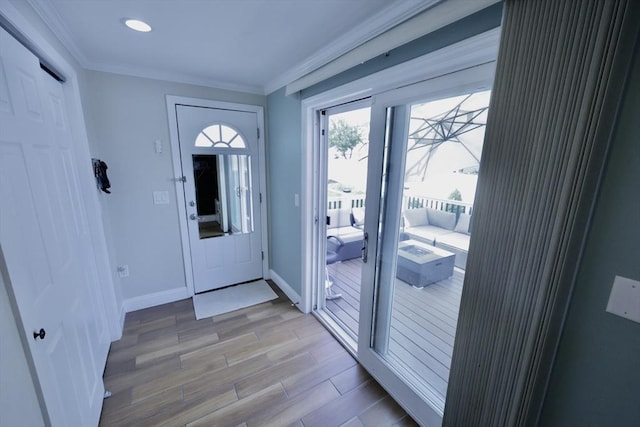 21 Florence Ave, Lowell, MA 01851 - foyer entrance with crown molding, baseboards, light wood-style flooring, and recessed lighting