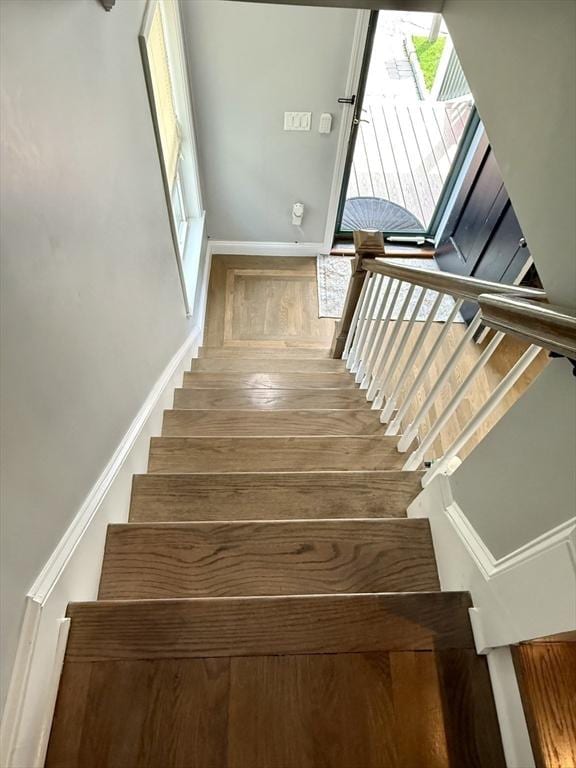 21 Florence Ave, Lowell, MA 01851 - stairway featuring baseboards and wood finished floors
