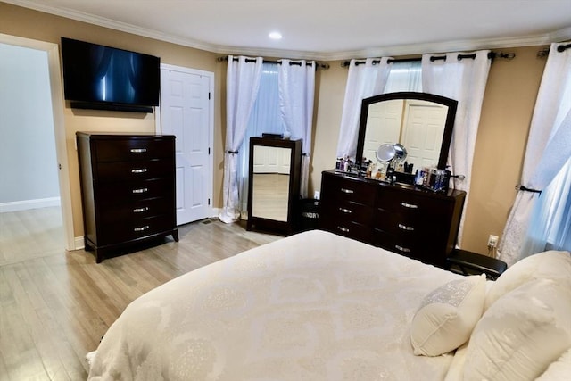 21 Florence Ave, Lowell, MA 01851 - bedroom with light wood-style flooring, baseboards, ornamental molding, and recessed lighting