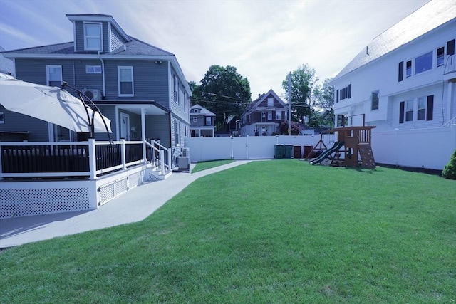 21 Florence Ave, Lowell, MA 01851 - view of yard with a playground and a deck