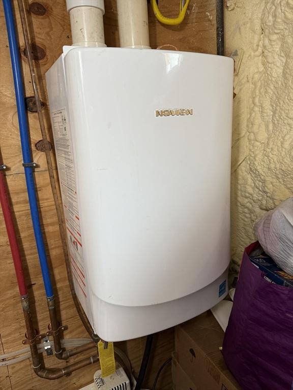 21 Florence Ave, Lowell, MA 01851 - utility room featuring water heater