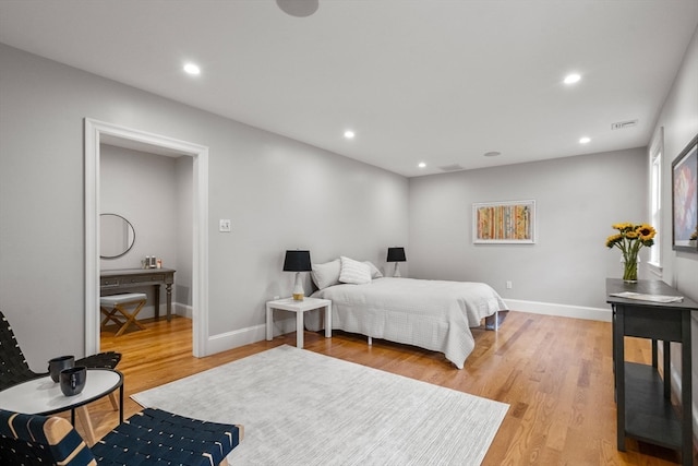 bedroom with wood-type flooring