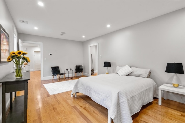 bedroom featuring light hardwood / wood-style floors