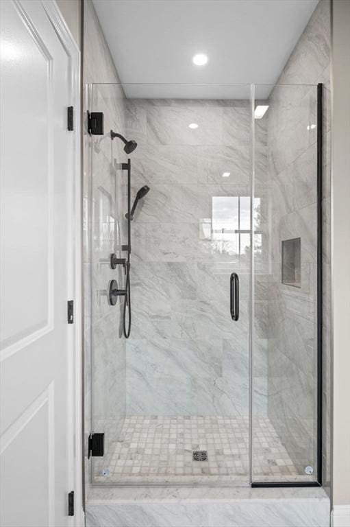 full bathroom with a stall shower