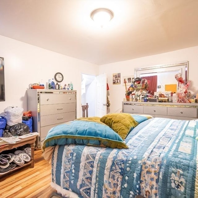 bedroom featuring light hardwood / wood-style flooring