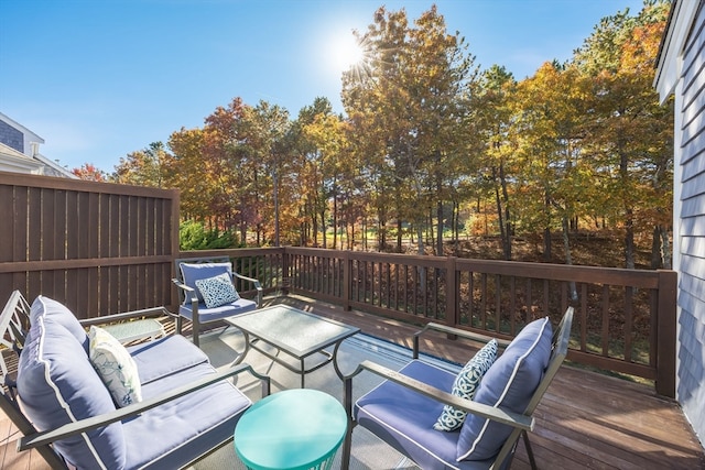 deck featuring outdoor lounge area