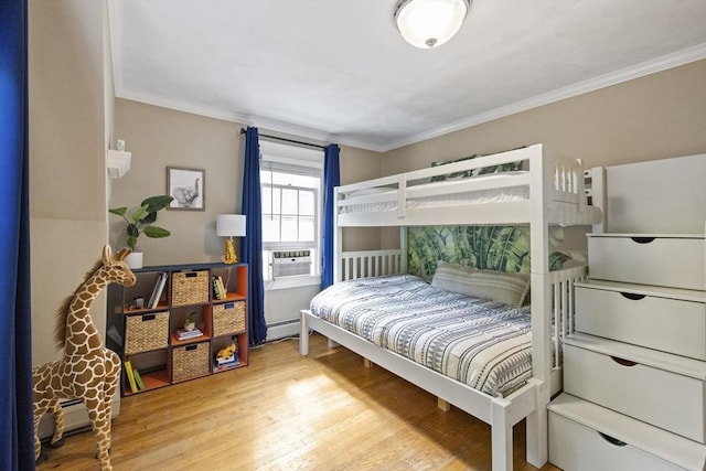 26 Edgewood Ave, Longmeadow, MA 01106 - bedroom featuring wood finished floors, a baseboard heating unit, cooling unit, and ornamental molding