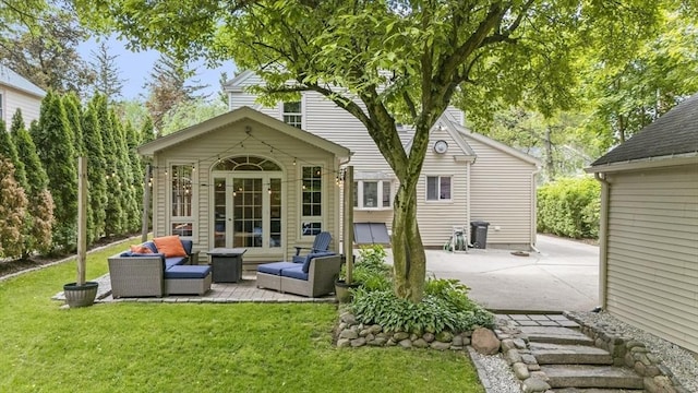 26 Edgewood Ave, Longmeadow, MA 01106 - back of property featuring outdoor lounge area, a lawn, and a patio