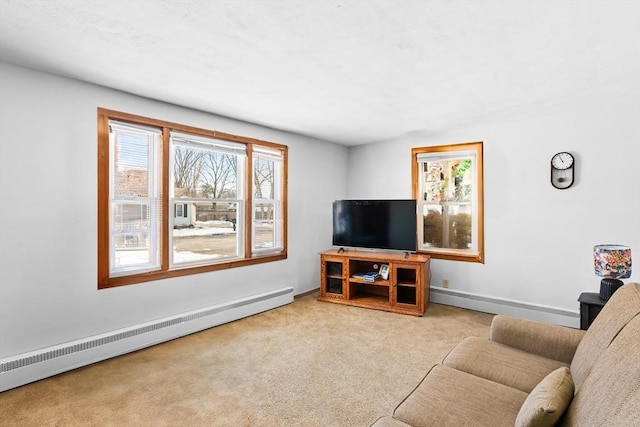 living room with light carpet and a baseboard heating unit