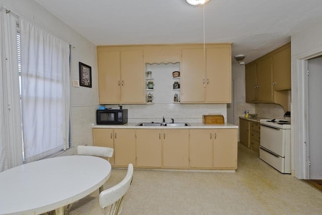 kitchen with white range with electric stovetop, a sink, black microwave, open shelves, and light countertops