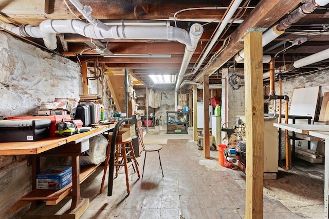 5 Eden Ct, Attleboro, MA 02703 - unfinished basement with a workshop area and washer / clothes dryer