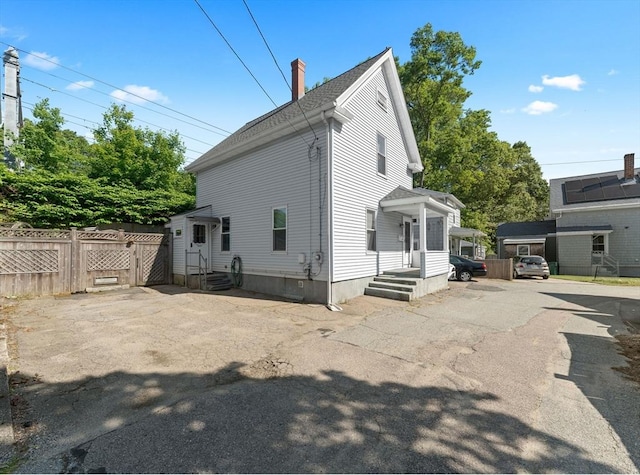 5 Eden Ct, Attleboro, MA 02703 - view of home's exterior featuring a chimney