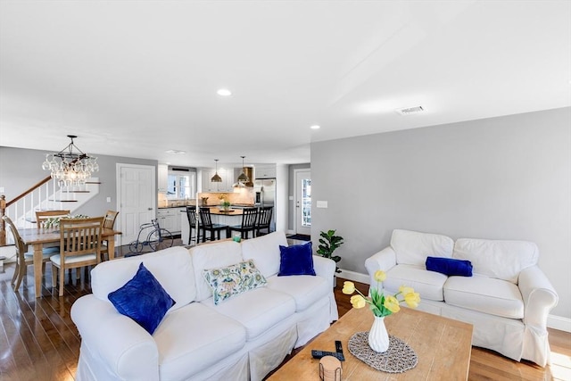 30 Millard Ave, Lynn, MA 01904 - living room featuring wood finished floors, recessed lighting, and a chandelier