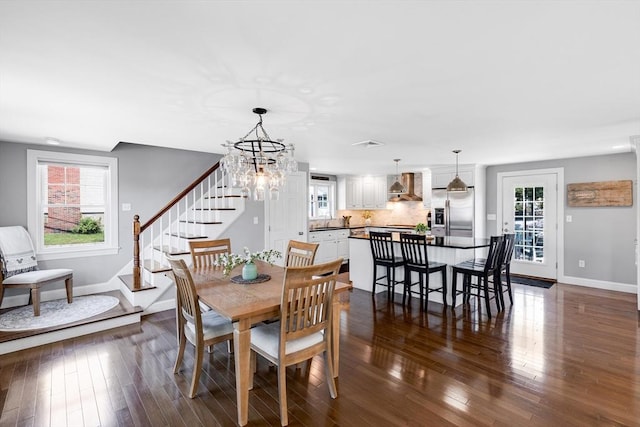 30 Millard Ave, Lynn, MA 01904 - dining room with dark wood-style floors, stairs, and a chandelier