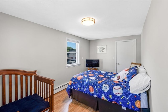 30 Millard Ave, Lynn, MA 01904 - bedroom featuring wood finished floors and baseboard heating