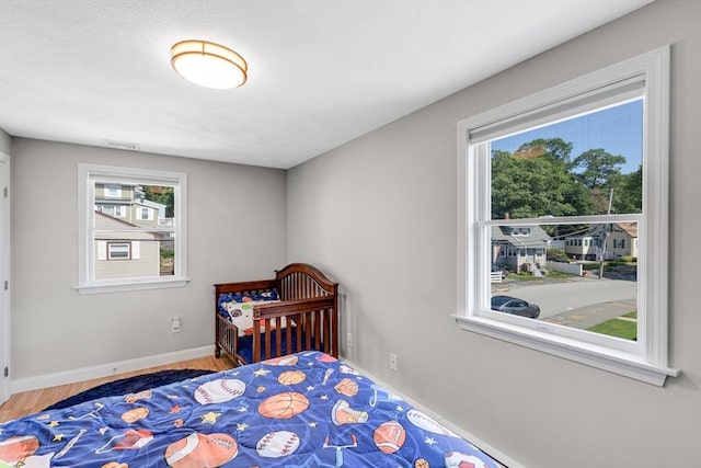 30 Millard Ave, Lynn, MA 01904 - bedroom featuring wood finished floors and baseboards