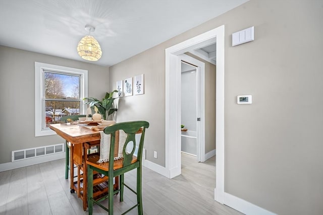 dining room featuring light wood-type flooring