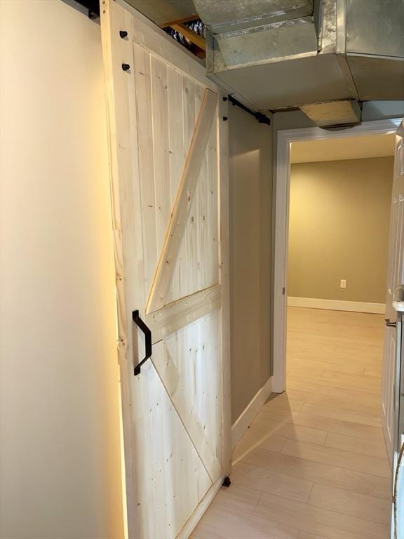 corridor featuring light hardwood / wood-style flooring