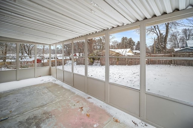 unfurnished sunroom with plenty of natural light