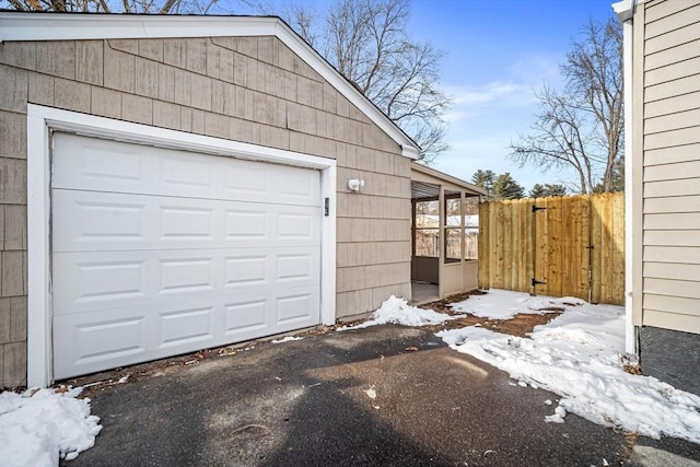 view of snow covered garage