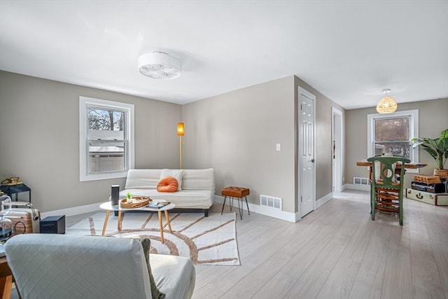 living room featuring light wood-type flooring