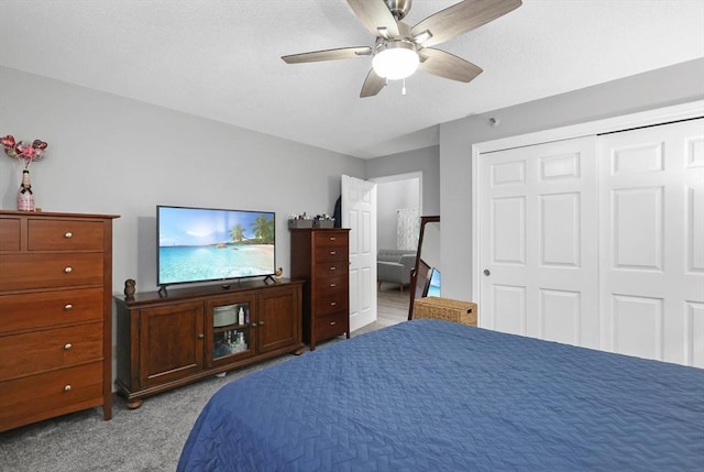 84 Tennis Plaza Rd Unit 46, Dracut, MA 01826 - bedroom featuring light carpet, a closet, and ceiling fan
