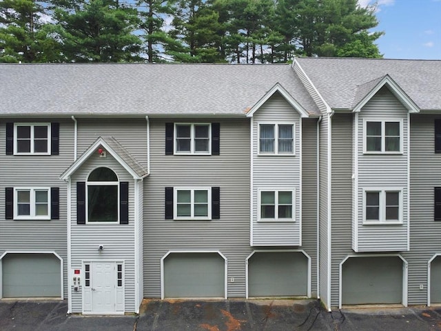 84 Tennis Plaza Rd Unit 46, Dracut, MA 01826 - townhome / multi-family property featuring an attached garage