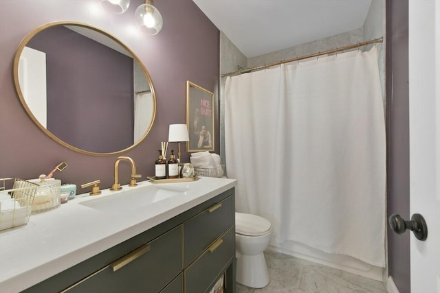 bathroom with vanity, a shower with curtain, and toilet