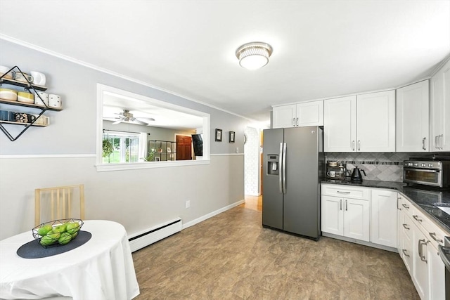 59 Searle Rd, South Hadley, MA 01075 - kitchen with stainless steel fridge with ice dispenser, baseboard heating, dark countertops, white cabinets, and backsplash