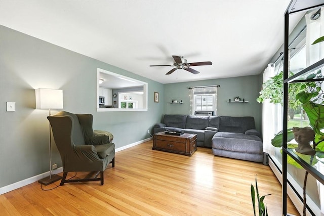 59 Searle Rd, South Hadley, MA 01075 - living room with light wood-style floors and ceiling fan