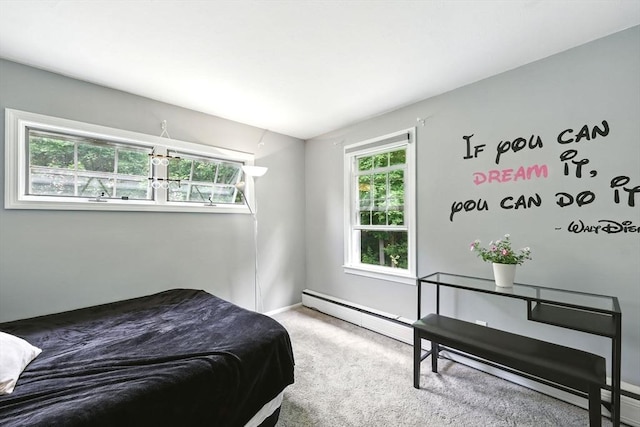 59 Searle Rd, South Hadley, MA 01075 - carpeted bedroom featuring a baseboard heating unit and baseboards