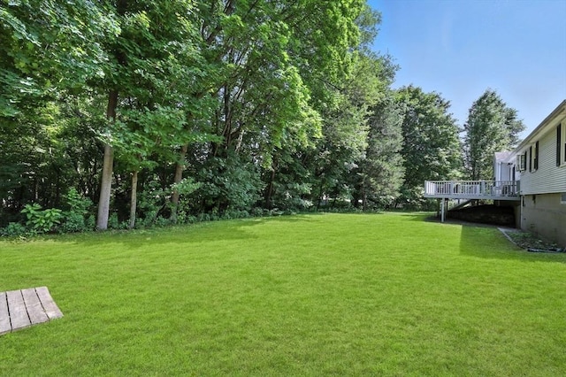 59 Searle Rd, South Hadley, MA 01075 - view of green lawn with a deck