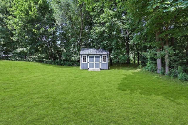 59 Searle Rd, South Hadley, MA 01075 - view of grassy yard with a storage unit