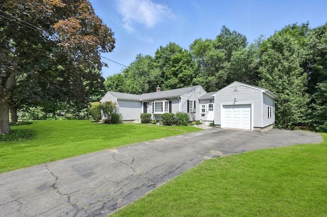 59 Searle Rd, South Hadley, MA 01075 - ranch-style home with an attached garage, a front yard, asphalt driveway, and a chimney